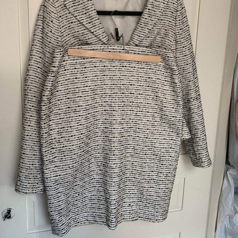 Kay Unger white and black suit